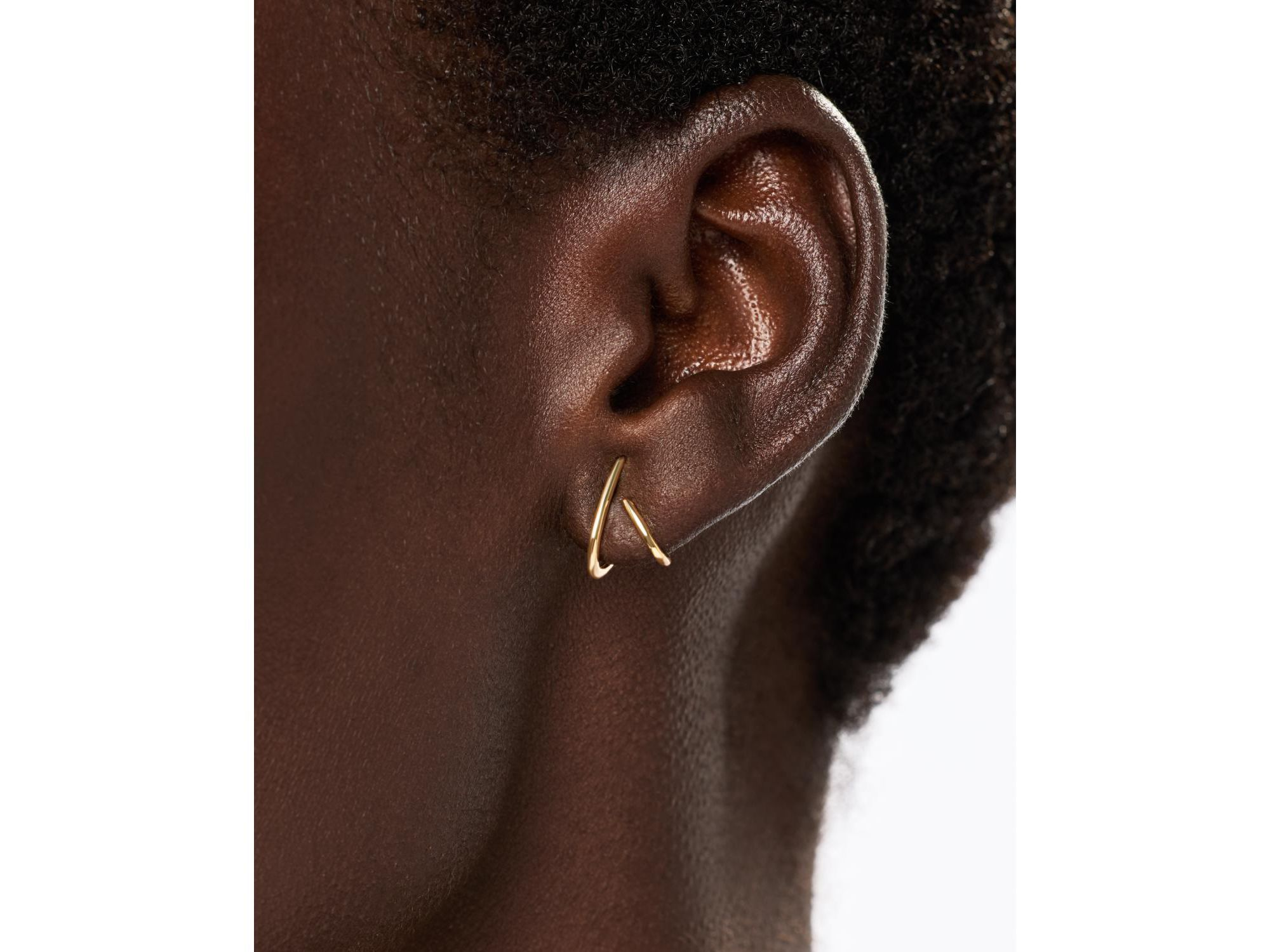 Solid Gold Aurora Huggie Studs — Image 3