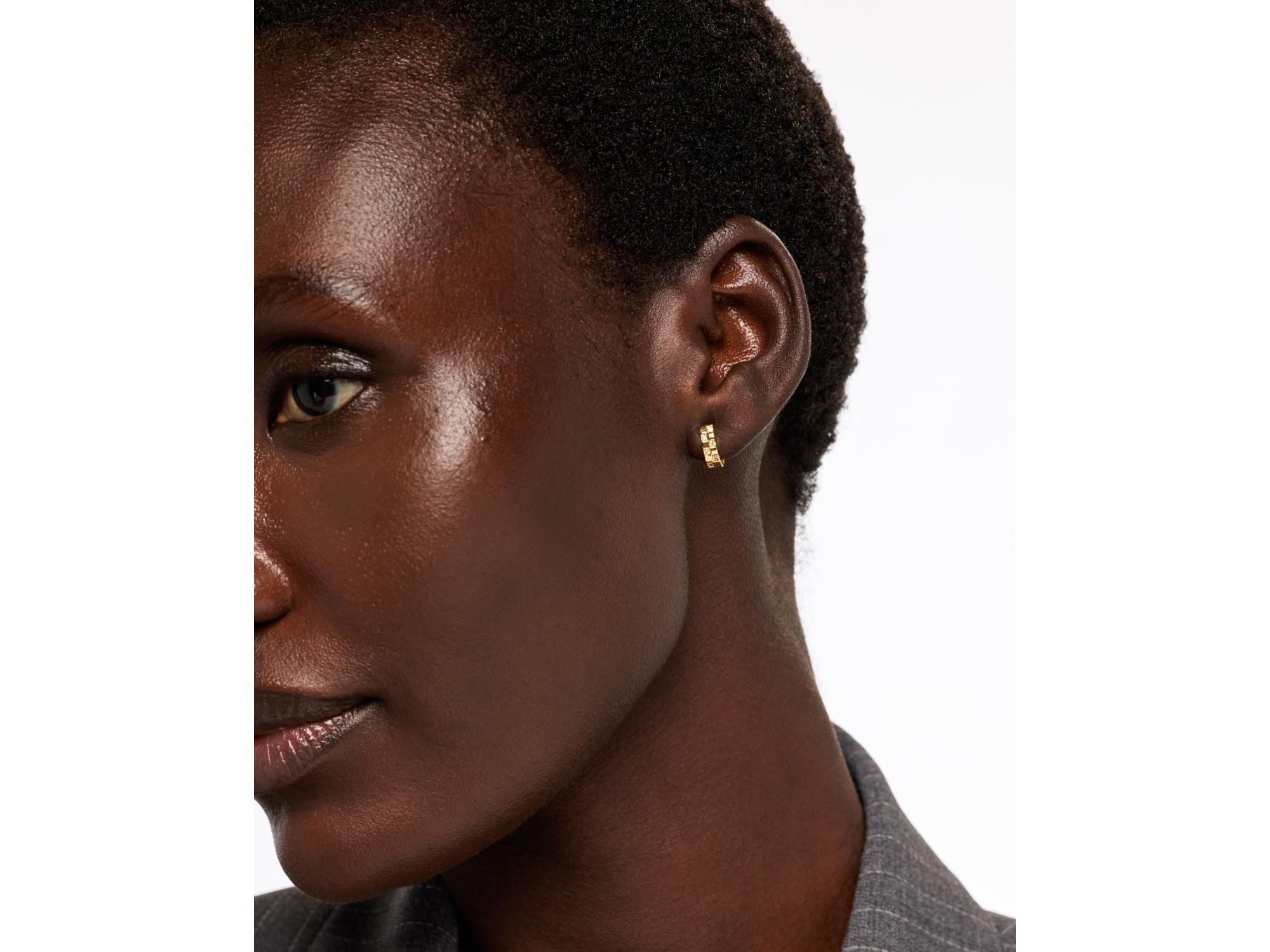 Brass and Cubic Zirconia Eden Mini Gold Huggie Earrings — Image 3