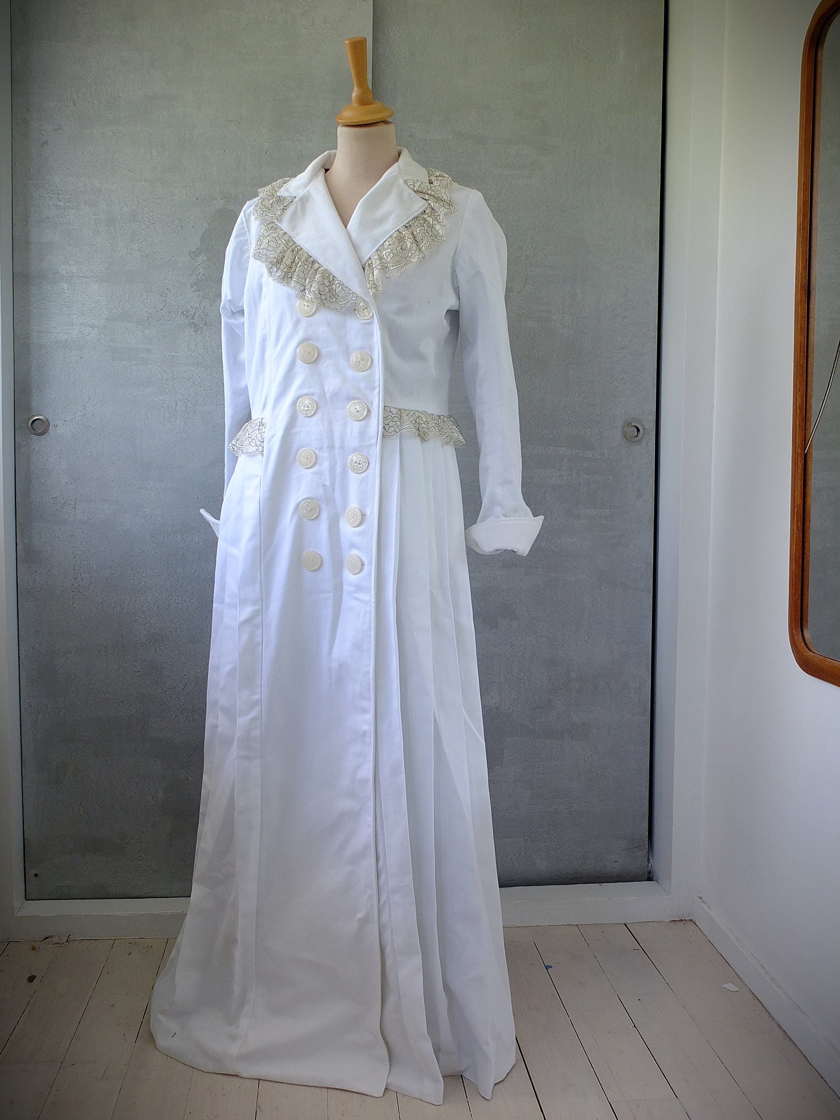 Christine’s pleated coat